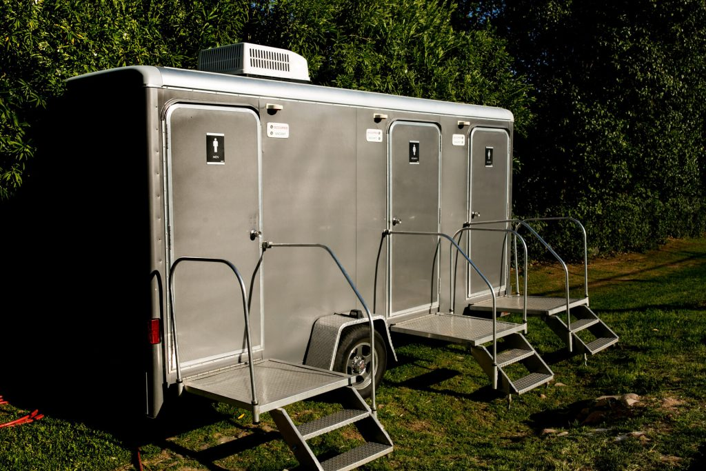 Enhancing Outdoor Events: The Essential Role of Portable Restrooms